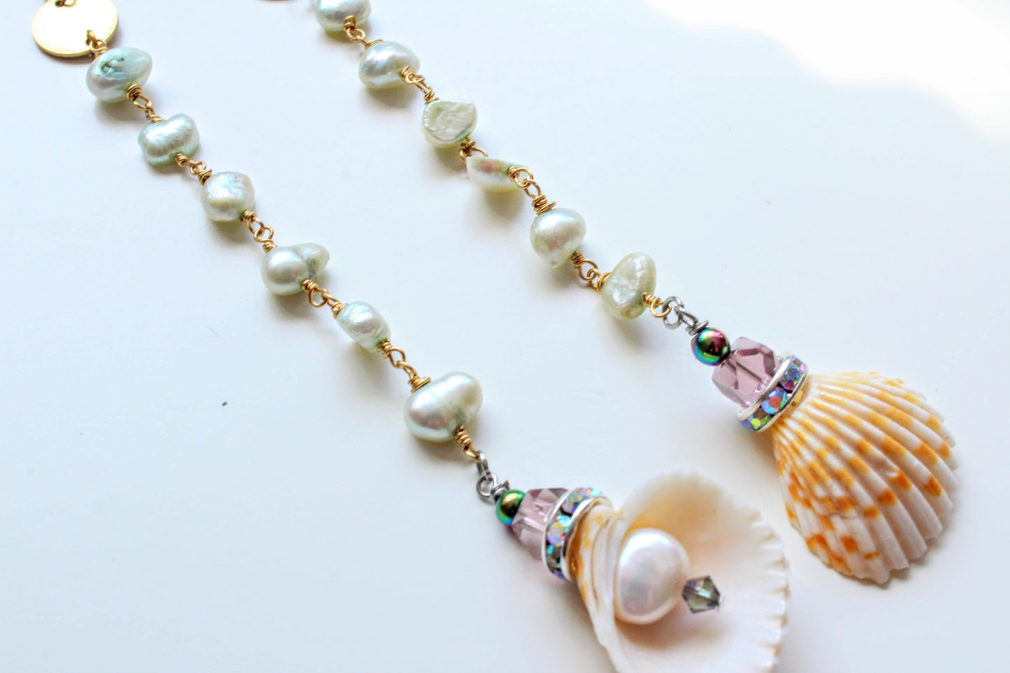 Clamshell drop pearl shoulder duster earrings